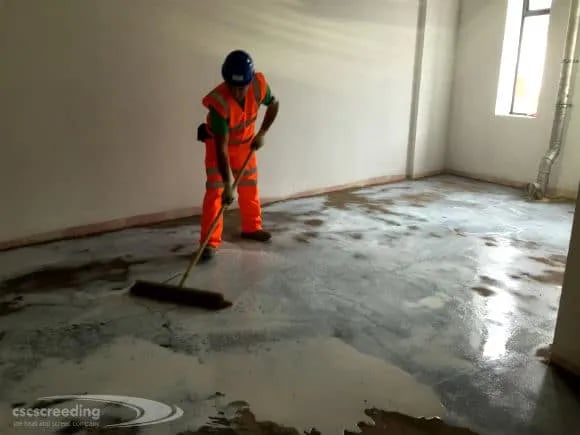 CSC operative, floor preparation prior to "Tuff Topping"