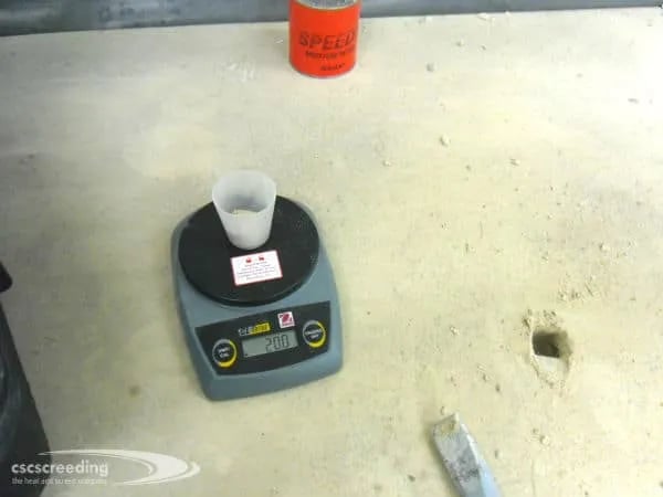 Taking a sample for a moisture test