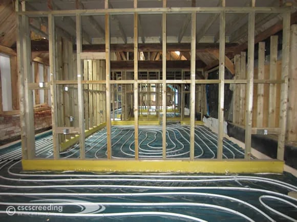 Underfloor heating is put down for a barn conversion prioject prior to screeding